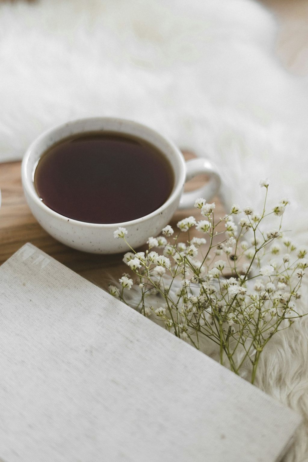 A cup of tea in a white ceramic mug